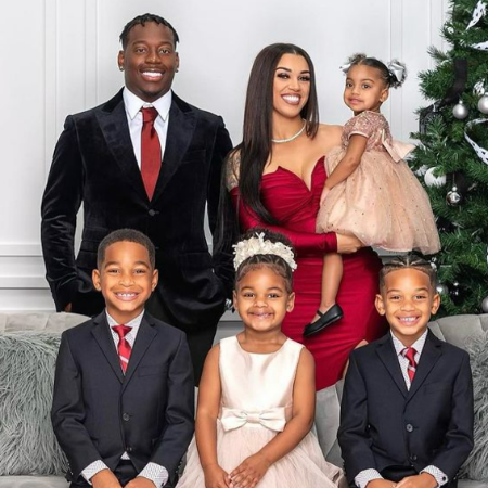 Biannca Prince with her husband and 4 children, celebrating Christmas.